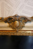 Highly decorative french mirror with original parcel gilt finish and original glass.