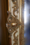 Highly decorative french mirror with original parcel gilt finish and original glass.