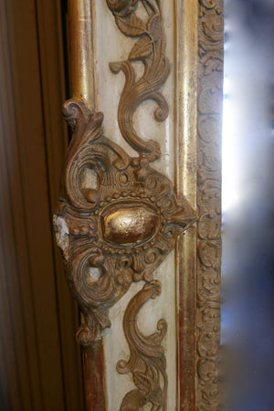 Highly decorative french mirror with original parcel gilt finish and original glass.