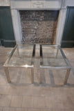 a 1970's chrome and gold coffee table with two undertables in the Romeo Rega style