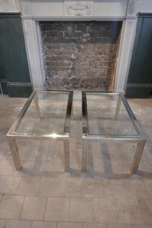 a 1970's chrome and gold coffee table with two undertables in the Romeo Rega style