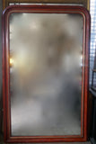 Large and decorative French mirror with original glass and parcel gilt frame circa 1900.