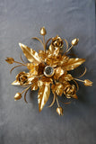 Highly decorative gold Italian ceiling light of floral design circa 1960 .