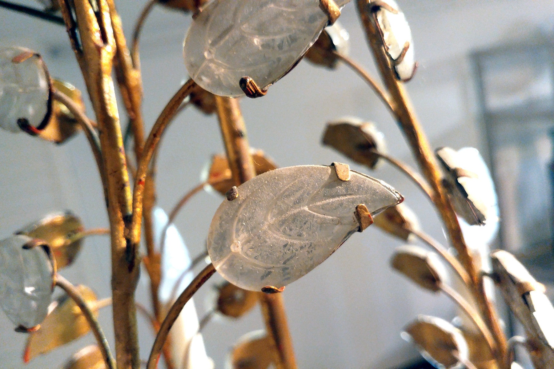 French gold and silver leaf chandelier in the Bagues style.