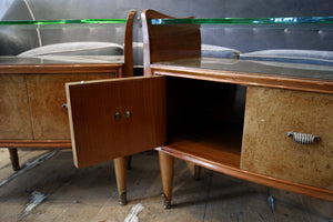 X Pair of Italian 1950s bedside cabinets with plate glass tops.