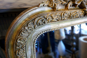 French Gilt Mirror with Decorative Louis XVI Style Details circa 1900 .