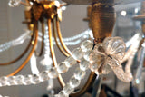 French gold and silver leaf chandelier in the Bagues style.