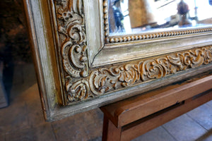 French Gilt Mirror with Decorative Louis XVI Style Details circa 1900 .