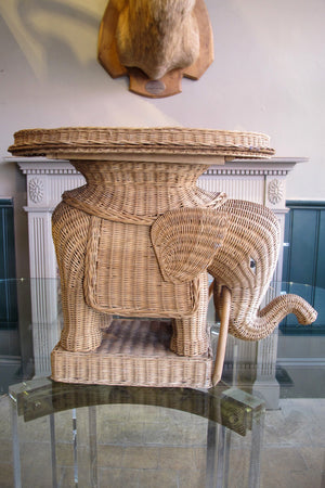 X A late twentieth century whicker table with a removable tray top modelled as an Elephant