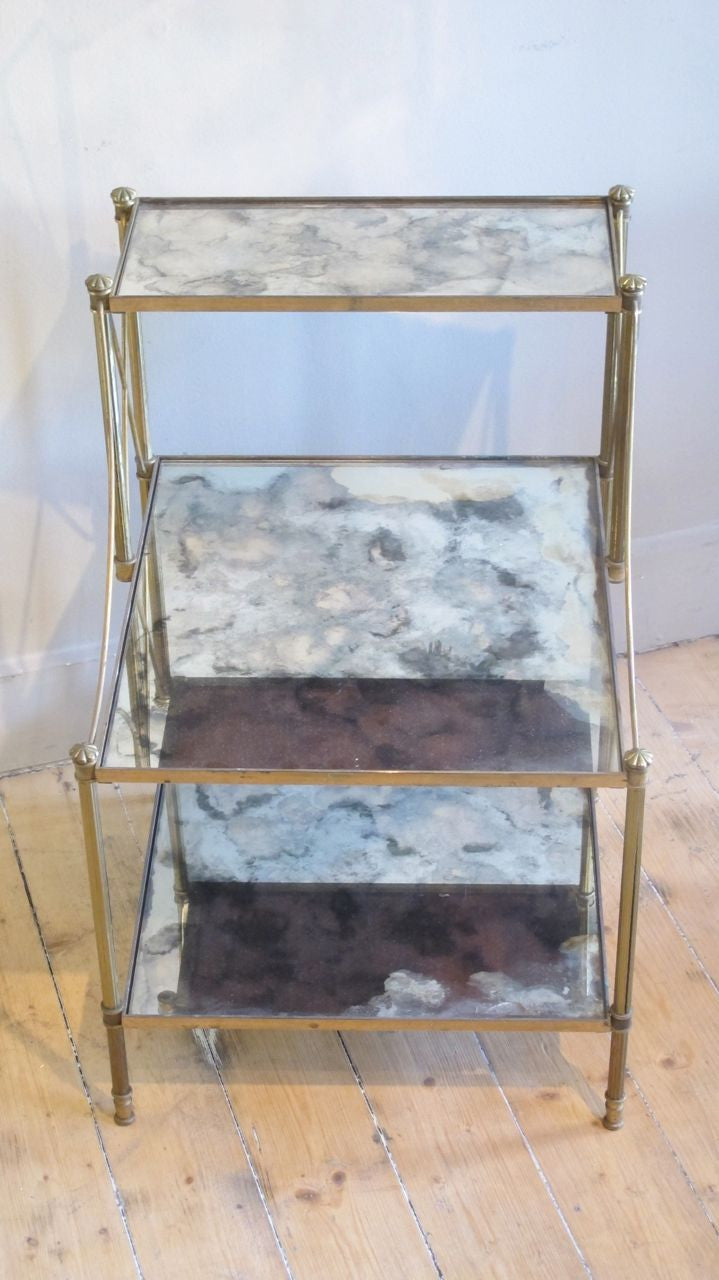 X Pair of superb quality french  brass 3 tier Side Tables with original mirrored shelves .
