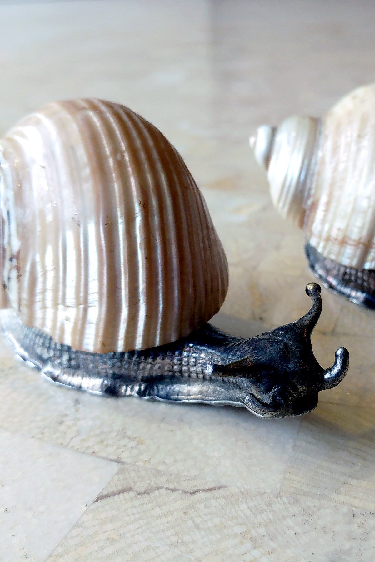 WMF (signed) silver plated snail with polished shell table ornaments.