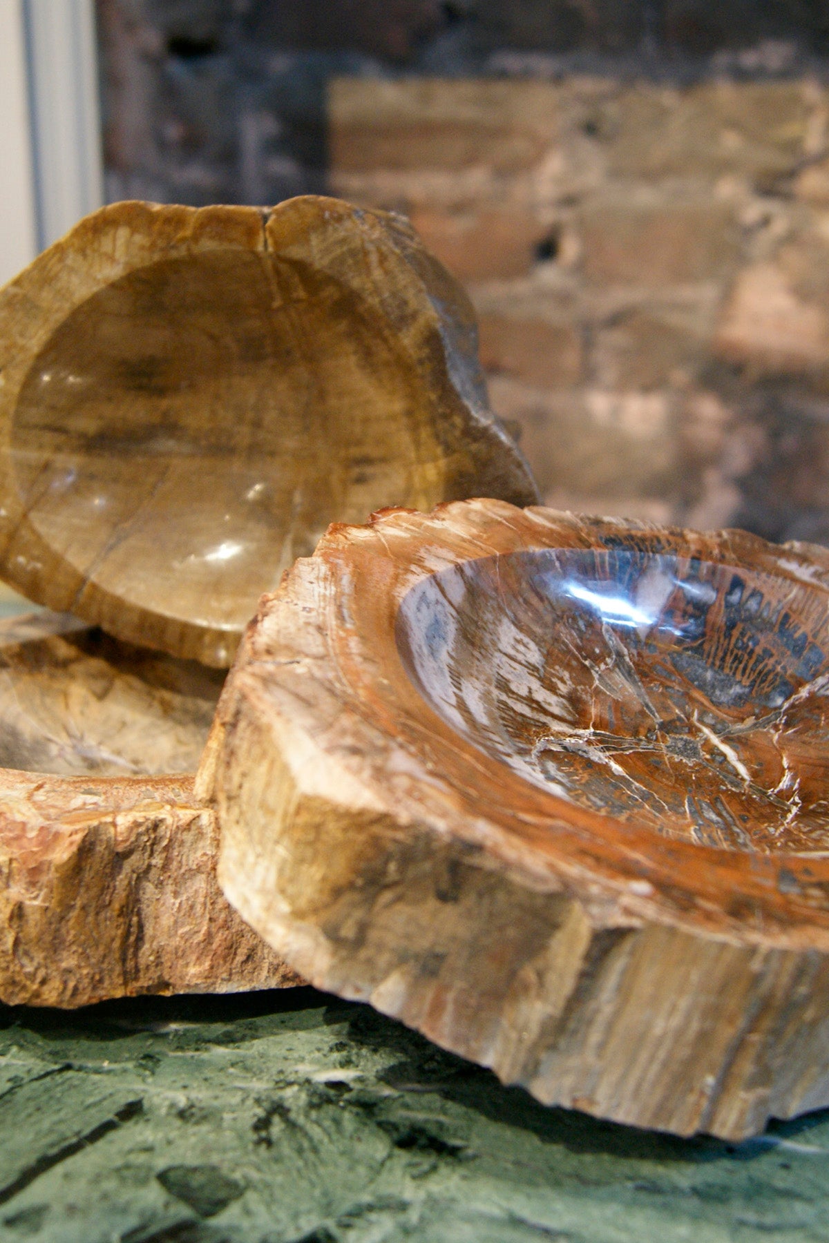 Selection of fossilised wood bowls.