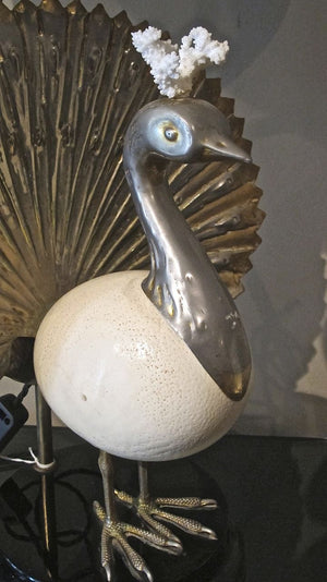 X An unusual peacock lamp made from ostrich egg pewter and coral circa 1970.