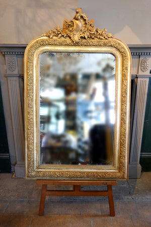 French Gilt Mirror with Decorative Louis XVI Style Details circa 1900 .