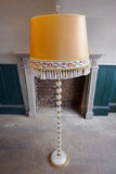 Detailed Glass Bodied Lamp with Tasseled Shade