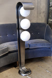 Italian steel and glass floor lamp circa 1970 .