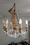 French gold and silver leaf chandelier in the Bagues style.