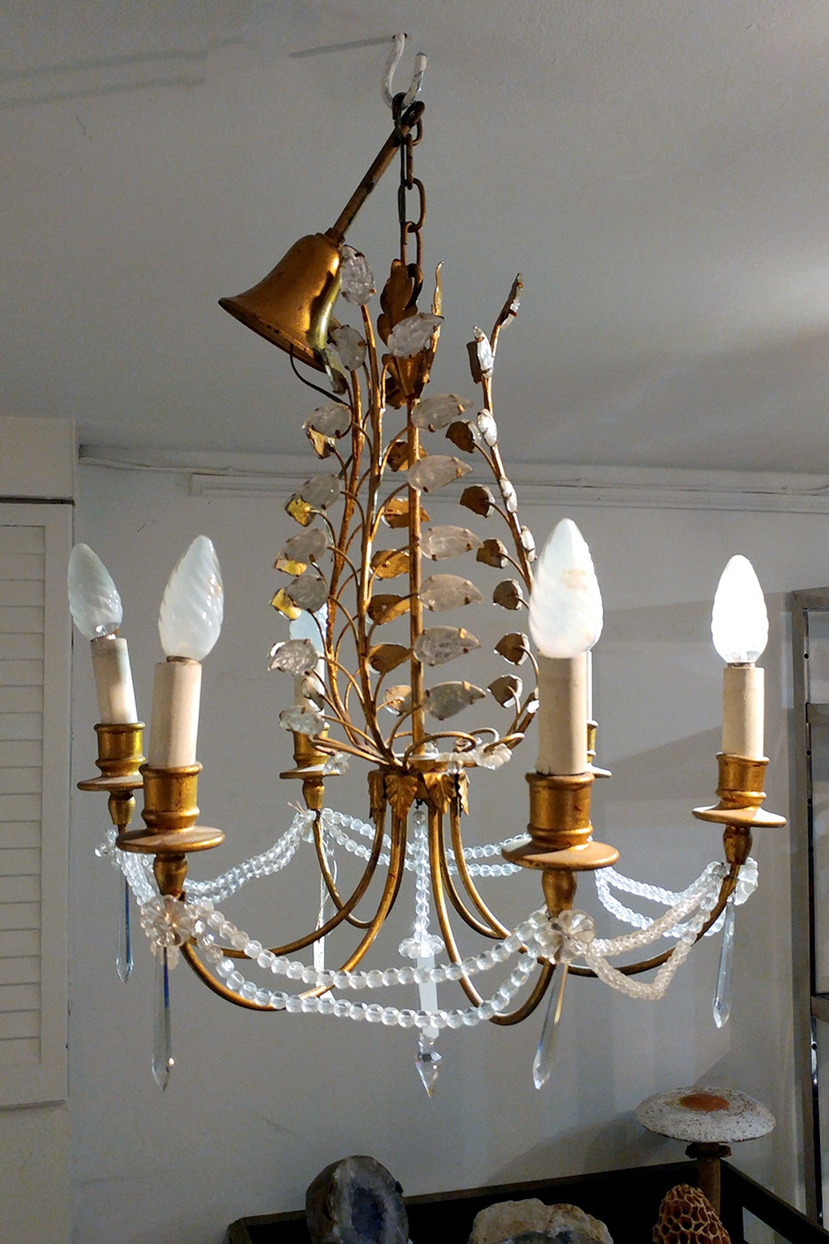 French gold and silver leaf chandelier in the Bagues style.