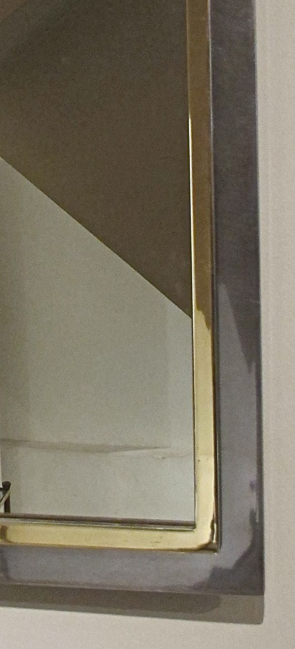 X 1970s steel and brass wall mirror